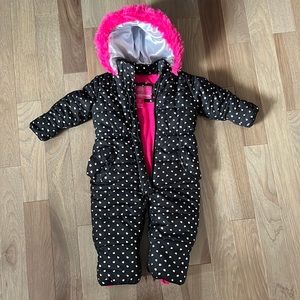 Weatherproof snow suit size 24 months. Black, pink, and silver in color.